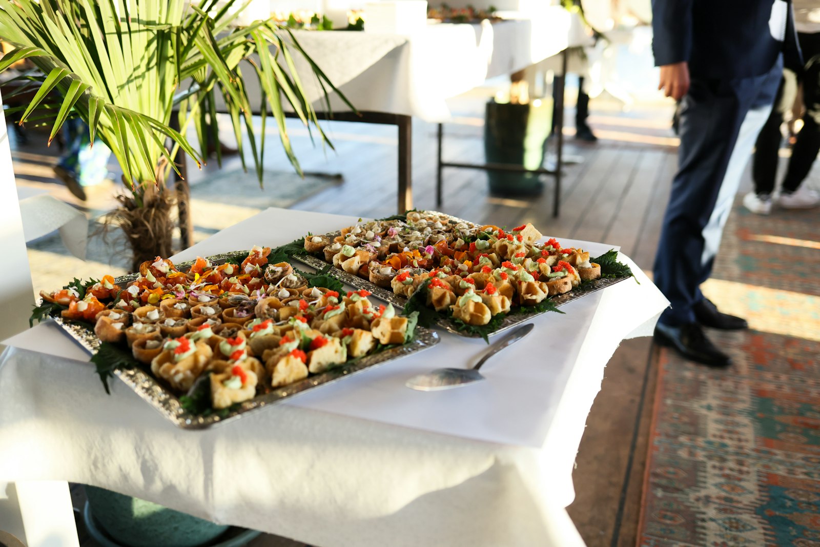 Long trays of canapes set out for an event
